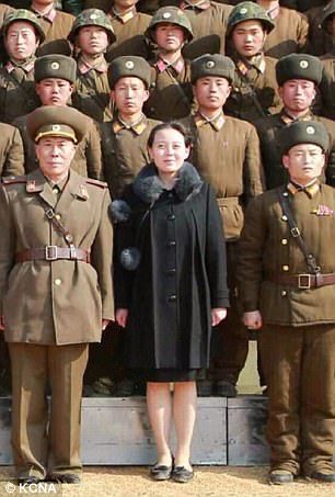 Kim Yo Jong, center, bottom row, poses with soldiers of the Korean People's Army. (KCNA)