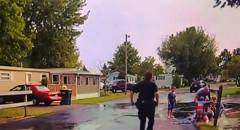 Officer Henning runs to the rescue