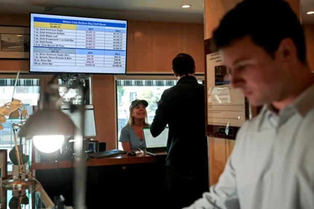 A screen shows gold prices at Witter Coins in San Francisco on Oct. 7, 2025. (Justin Sullivan/Getty Images)