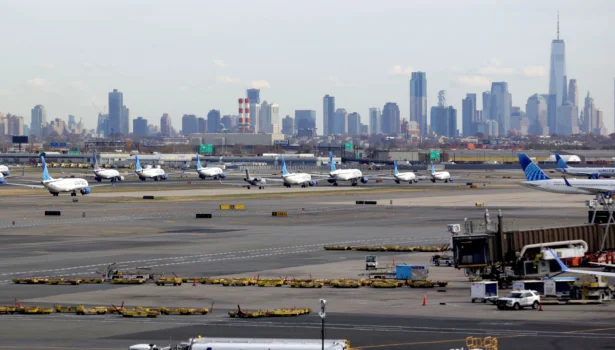With the New York City skyline in the background, United Airlines flights are lined up for takeoff at Newark Liberty International Airport in Newark, New Jersey, on Nov. 7, 2025. (Timothy A. Clary/AFP)