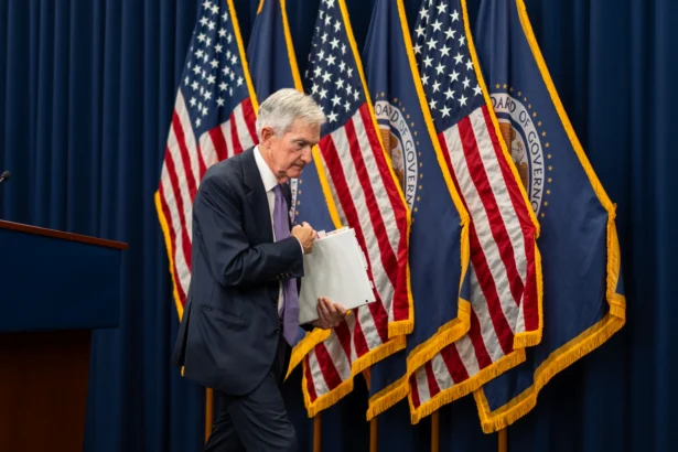 Federal Reserve Chair Jerome Powell leaves after speaking at a news conference following the Federal Open Market Committee (FOMC) meeting in Washington on Oct. 29, 2025. (Madalina Kilroy/The Epoch Times)