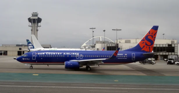 A Sun Country Airlines Boeing 737-800 jet taxis at Los Angeles International Airport. (Daniel Slim/AFP via Getty Images)