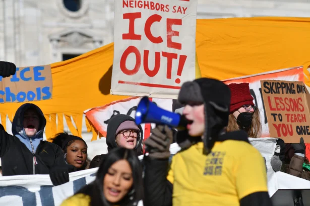 High school students at the State Capitol in St. Paul, Minn., call for an end to federal immigration enforcement operations. (Octavio Jones / AFP via Getty Images)
