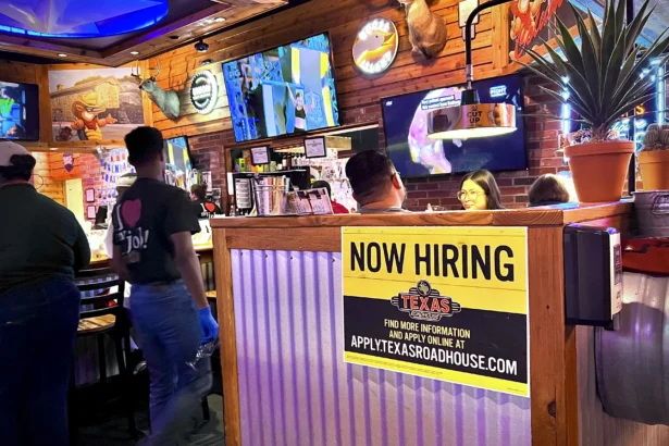 A hiring sign at a restaurant in Columbia, Md., on June 15, 2024. (Madalina Vasiliu/The Epoch Times)