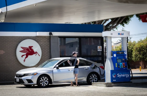 A customer pumps gasoline in Los Angeles on July 1, 2025. (John Fredricks/The Epoch Times)