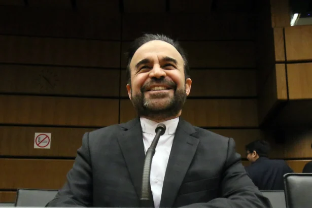 Iran's Ambassador to the International Atomic Energy Agency (IAEA), Reza Najafi, waits for the start of the IAEA board of governors meeting at the International Center in Vienna, Austria, on Nov, 26, 2015. (Ronald Zak/AP Photo)