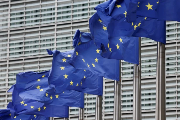 European Union flags flutter outside the EU Commission headquarters in Brussels, Belgium, on July 16, 2025. (Yves Herman/Reuters)