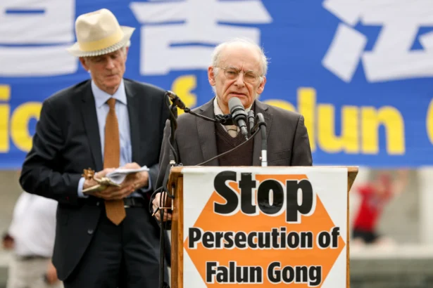 David Matas (R) speaks at a rally after receiving the Friends of Falun Gong Human Rights award jointly with David Kilgour (L) in Washington on June 20, 2018. (Samira Bouaou/The Epoch Times)