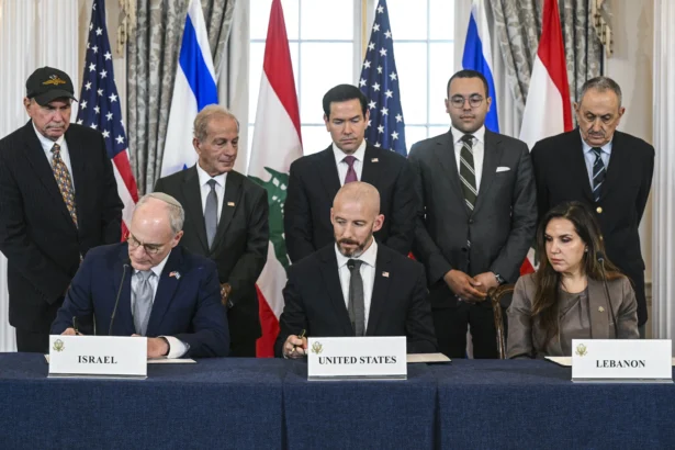 Secretary of State Marco Rubio (C, back row) looks on as (L–R, front row) Israeli Ambassador to the United States Yechiel Leiter, State Department Chief of Staff Daniel Holler, and Lebanese Ambassador to the United States Nada Hamadeh sign a framework agreement at the U.S. Department of State in Washington, on June 26, 2026. (Saul Loeb / AFP via Getty Images)