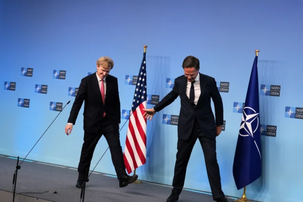 NATO Secretary General Mark Rutte (R) and U.S. Undersecretary of Defense Elbridge Colby leave the podium after addressing reporters at NATO headquarters in Brussels on Aug. 27, 2026. (Virginia Mayo/AP Photo)